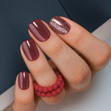 Burgundy Bling short squoval press-on nails from the side