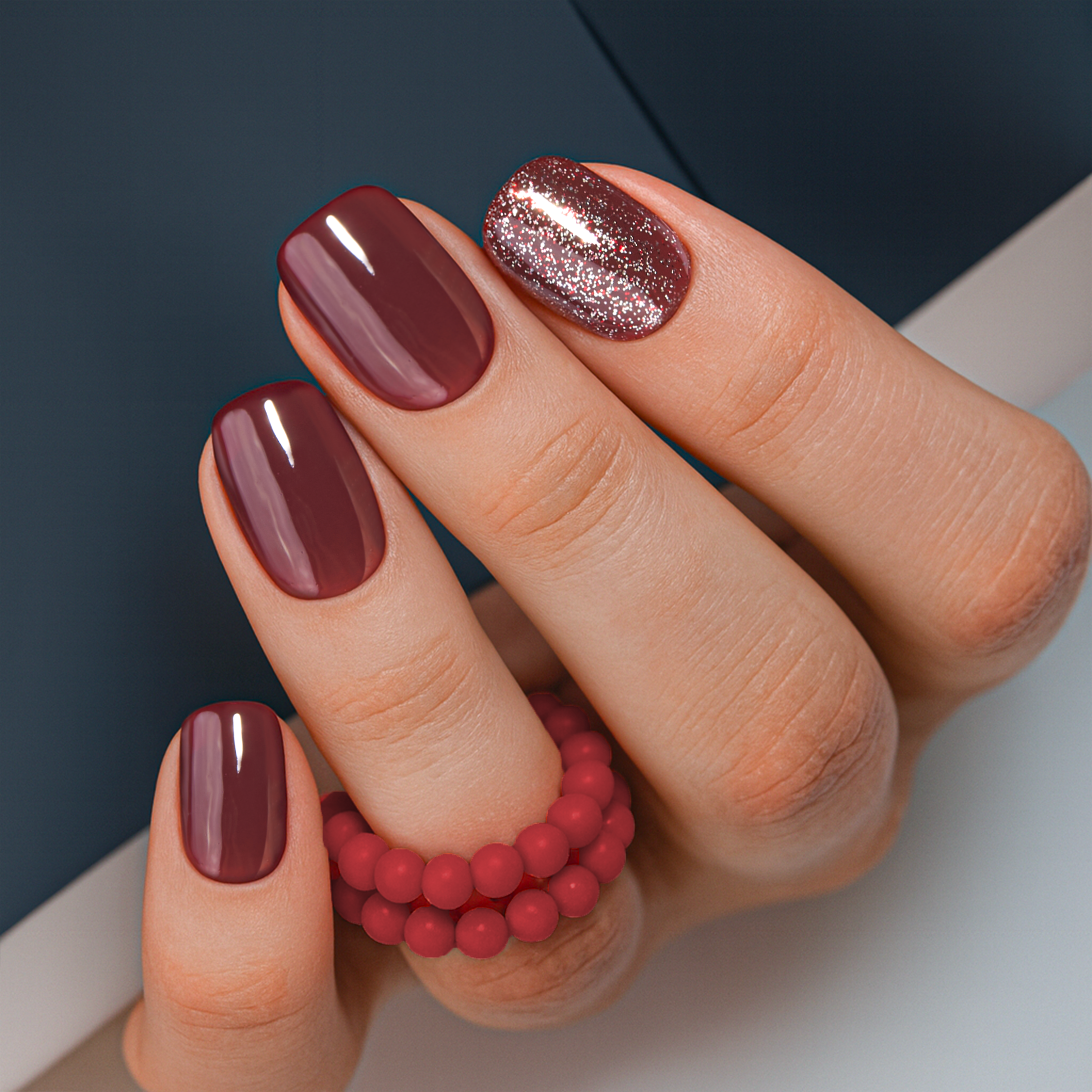 Burgundy Bling short squoval press-on nails from the side