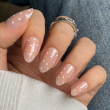 Dotted Milk Glow short almond press-on nails