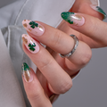 Lucky Charm short almond press-on nails
