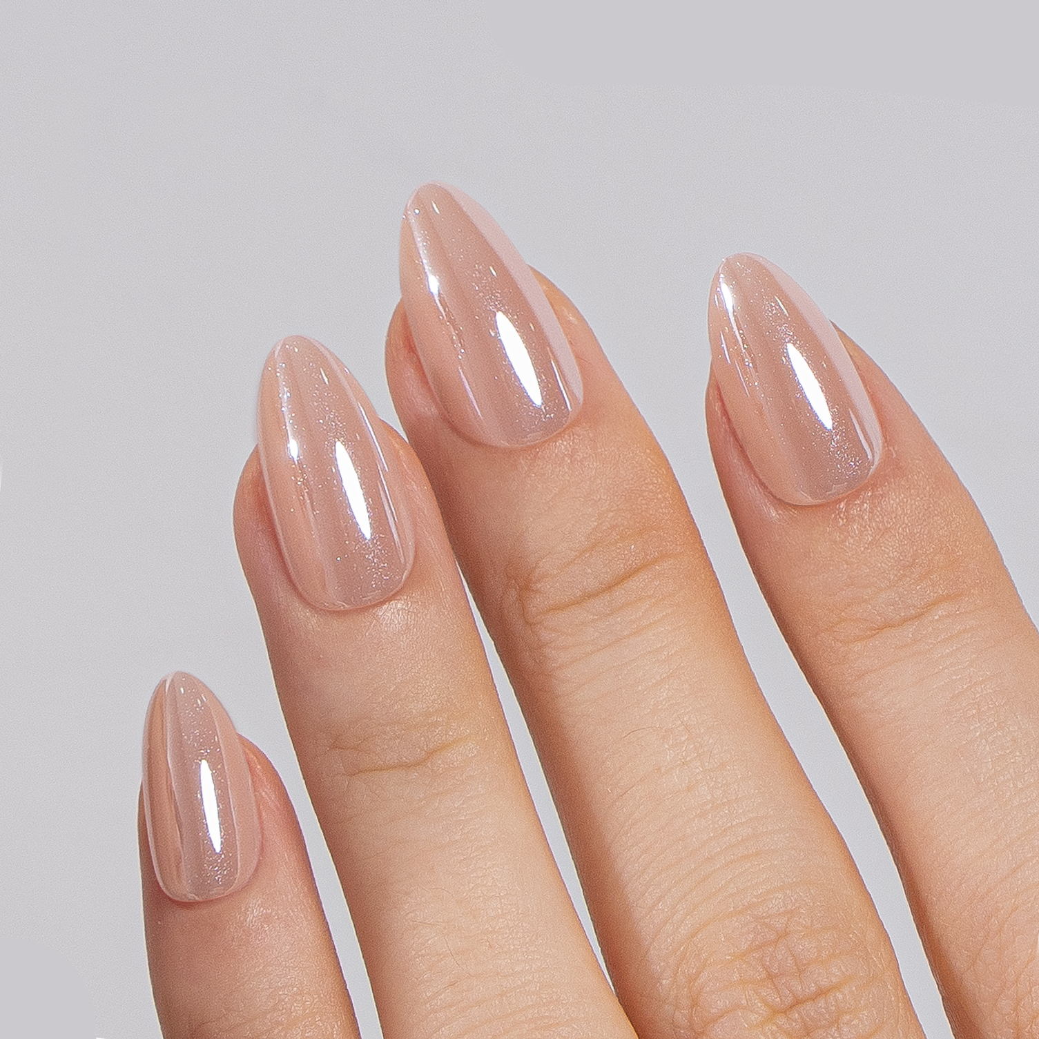 Soft Nude Charm short almond press-on nails