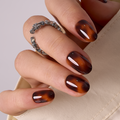 Sunset Wild short oval press-on nails